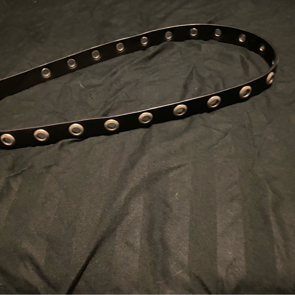 Black belt with holes